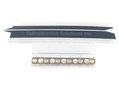 Black strip of splice tape, 8mm size, connected with a brass splice shim