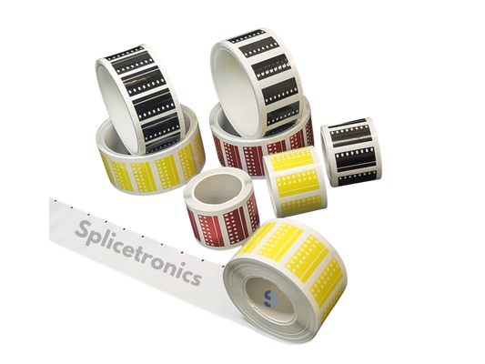 Rolls of Splicetronics label rolls on a white background